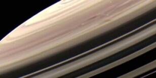 Exploring the Enigmatic Terrain of Saturn: A Close-Up Look at the Mysterious Surface